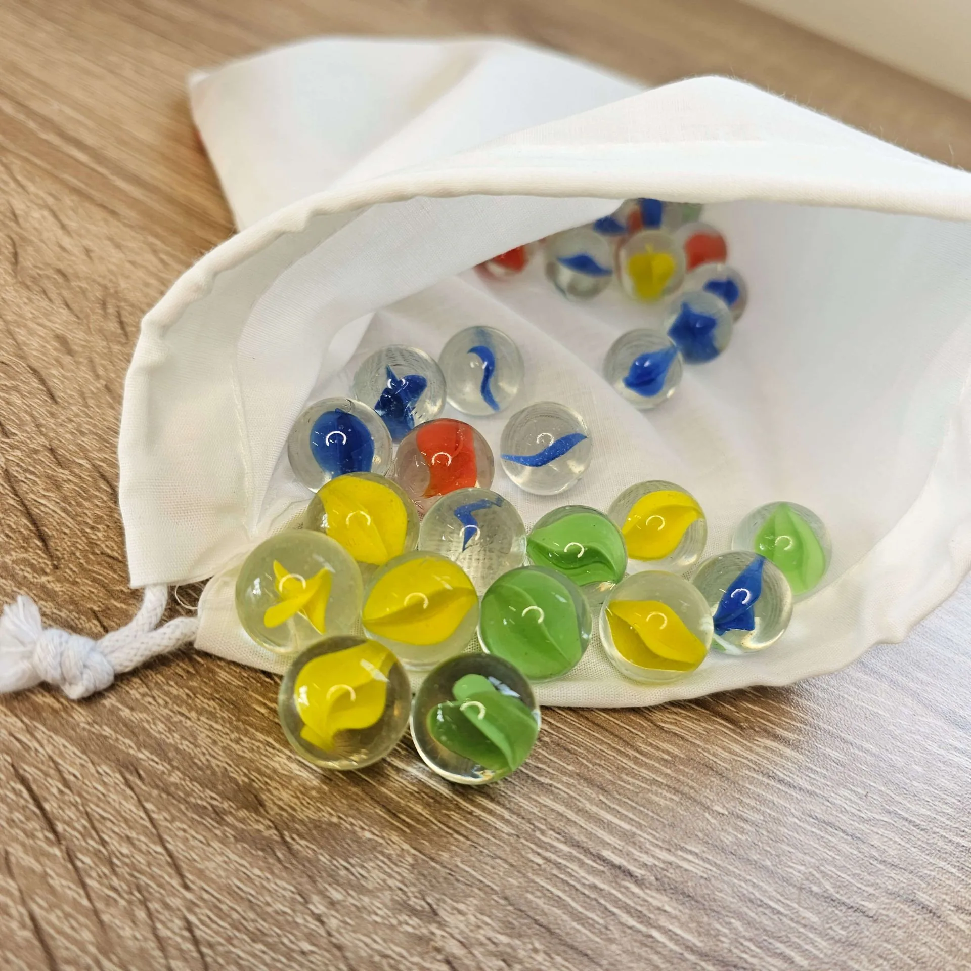 Murmel-Mix, 50er Set inklusive Stoffsäckchen — Millhouse Lernspielzeug Schule