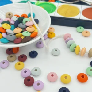 Watercolors Linsen-Perlen Holzlinsen 10mm • 50 Stück — Kiki-Ena Bastelmaterial Naturholz